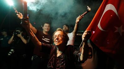 Supporters of Ekrem Imamoglu celebrate the mayoral election result. AP / Lefteris Pitarakis