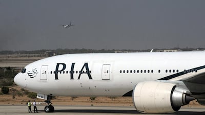 Hundreds of Pakistanis who arrived on a Pakistan International Airlines flight were refused entry into Dubai for failing to meet tourist visa entry requirements. Asif Hassan / AFP