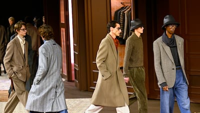 Nostalgia surfaced at Zegna too, conveyed through a set that resembled a wardrobe – the sort where cherished heirlooms are quietly rediscovered. EPA