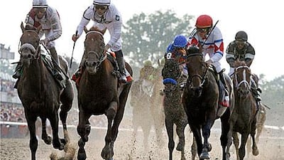 Mike Smith, riding Drosselmeyer, second left, won the 142nd Belmont Stakes, the final leg of racing’s Triple Crown at Belmont Park in Elmont, New York.