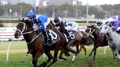 Jockey Hugh Bowman rides Winx, left, to victory in the Winx Stakes at Royal Randwick racecourse in Sydney in August 2018. AFP