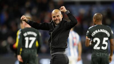 Pep Guardiola celebrates after seeing his Manchester City team come from behind to beat Huddersfield Town 2-1 at the John Smith's Stadium. Carl Recine / Reuters