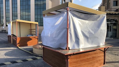 The kiosks were shut down after The National alerted the authorities to the games, which low paid workers lost hundreds of dirhams on. Chris Whiteoak / The National