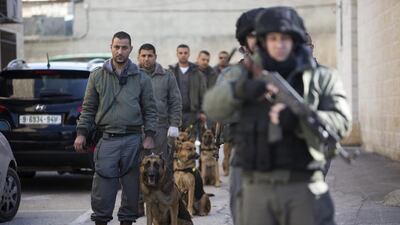 Palestinian security forces line up for a drill near the Church of the Nativity, believed to be the birthplace of Jesus Christ, in the West Bank city of Bethlehem (AP Photo/Majdi Mohammed)