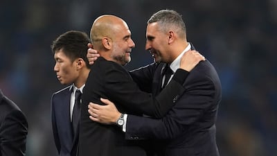 Manchester City chairman Khaldoon Al Mubarak and manager Pep Guardiola. PA