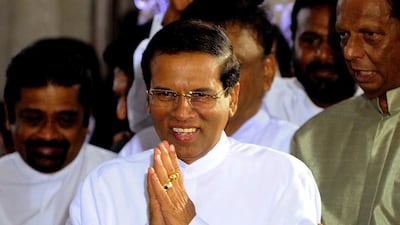 Sri Lanka's newly-elected president Maithripala Sirisena greeted the crowds after being sworn in at Independence Square in Colombo on January 9, 2015. Ishara S Kodikara/AFP Photo