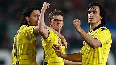 Borussia Dortmund's Sven Bender, centre, and Mats Hummels, right, represent a bright future for the club.