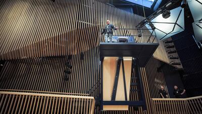 The piano sits about three storeys above the audience. AFP