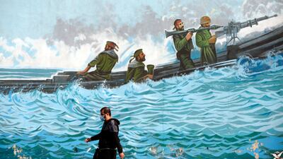 A mural, depicting members of the Islamic Revolutionary Guard Corps in the waters of the Arabian Gulf, in Tehran. EPA