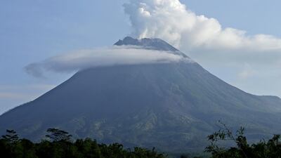 Mount Merapi spews volcanic steam from its crater seen from Sleman, Yogyakarta, Indonesia. AP Photo