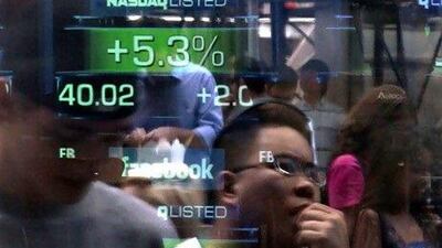 A long-term view and never borrowing to invest in stock markets are just two rules for the average investor to follow. Bebeto Matthews / AP