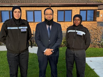 DS Yassin Desai with two Leicestershire Police colleagues. Leicestershire Police