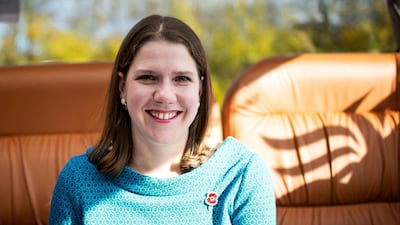 Britain's Liberal Democrat Leader Jo Swinson poses for a photograph at the back of her campaign bus on the way to Midsomer Norton for her first engagement as part of the General Election campaign trail, in Somerset, England, Thursday, November 7, 2019.Aaron Chown/PA via AP