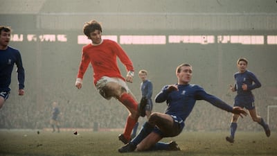 George Best is challenged by Chelsea's Ron Harris in 1971. Getty