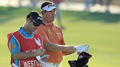 Lee Westwood, right, and his caddy Billy Foster discuss a shot during the weekend at the Abu Dhabi Championship.