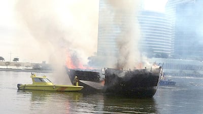 Two boats on fire in Jedaf on Dubai Creek this morning at about 9am. One of the vessels is believed to be a cargo launch. Two explosions were heard by passers-by and thick plumes of smoke could be seen from the Business Bay Crossing nearby. Civil Defence said fire crews were trying to extinguish the flames. (The National- Preeti Kannan)