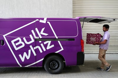 A 'Customer Whiz' loading orders in the delivery van at the BulkWhiz warehouse in Al Quoz in Dubai. Pawan Singh / The National