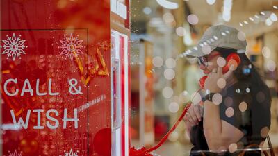A mall in Dubai has set up a telephone booth with 'Santa Claus' on the other end of the line. Photo: City Centre Deira