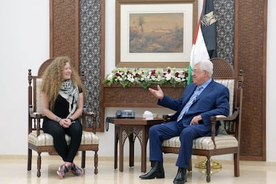 Palestinian President Mahmoud Abbas meets freed Palestinian teenager Ahed Tamimi, hours after she was released from an Israeli prison. PPO
