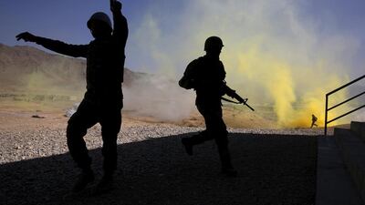 Afghan National Army officers participate in a training exercise at the Kabul Military Training Centre. Ahmad Masood / Reuters