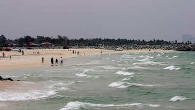 Sharjah, United Arab Emirates - March 25, 2013. Rough waters and dark skies at Sharjah beach shores. ( Jeffrey E Biteng / The National )