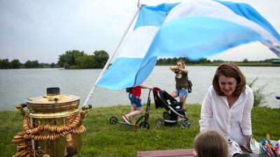 Villagers of Bronnitsy gather to celebrate Lionel Messi's 31st birthday. Getty
