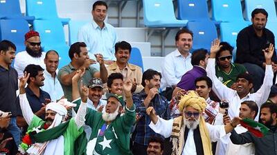 Pakistan fans at Dubai's International Cricket Stadium for the Test between Pakistan and England in January 2012.