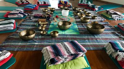 Preparations for a sound healing session with Tibetan singing bowls at Ascension Platforms in Dubai. Courtesy Ascension Platforms