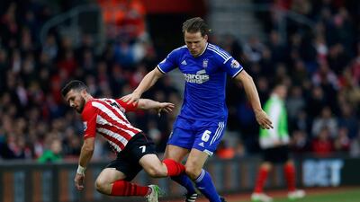 Shane Long of Southampton and Christophe Berra of Ipswich Town battle for the ball in their 1-1 FA Cup third round draw on Sunday, requiring a replay. Steve Bardens / Getty Images