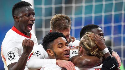 Emil Forsberg (R) of Leipzig celebrates with teammates after scoring their second. EPA