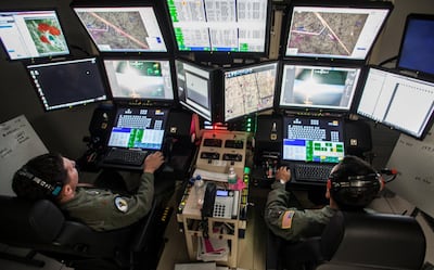 An air crew from the California Air National Guard fly an unmanned MQ-9 Reaper drone to scan a wildfire in the US state. Reuters