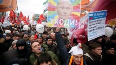 Despite facing protests in Moscow, Russian President Vladimir Putin still won March's election with an overwhelming majority. Pavel Golovkin / AP Photo