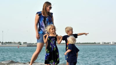 Zoe Hedrick, 6, with her brothers Liam, 3; Jack 1 and their mother, Keri Hedrick who is a travel blogger. Delores Johnson / The National