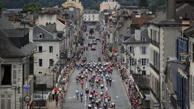 The peloton leaves the start town of Pau during Stage 8 stage of the 103rd Tour de France cycling race over 184km between Pau and Bagneres-de-Luchon, France, 09 July 2016. Yoan Valat / EPA