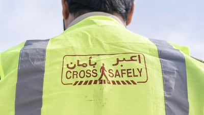 First Lieutenant, Mohammad Al Badwawi surveys the traffic on Sheikh Mohammed Bin Zayed Road.