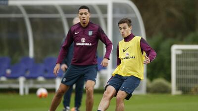 Tottenham’s Harry Winks helps make up numbers for a kick-about with the England squad. Reuters