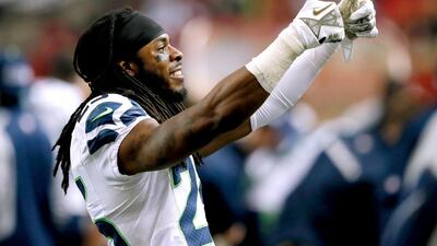 Seattle defensive back Richard Sherman narrowly avoided falling foul of the NFL's drug policy, winning his case on appeal. Kevin C. Cox / AFP