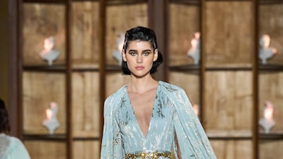 A pale blue gown embellished with muted silver at Rami Al Ali. Photo: Rami Al Ali