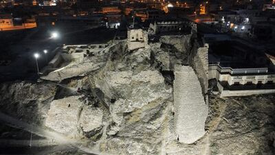 The illuminated ruins of the 13th century palace Qara Serai – the Black Palace – of the Zengid Turkoman Sultan Badr Al Din Lu'lu', in Iraq's northern city of Mosul, on the seventh anniversary of the city's fall to ISIS. AFP