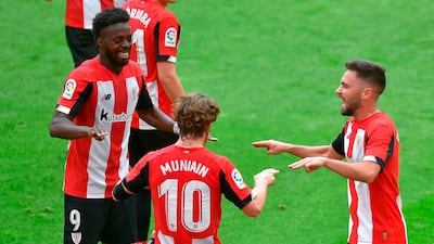 Athletic Bilbao's Iker Muniain celebrates with teammates after scoring. AFP