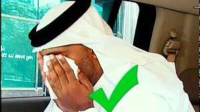 An image from an advertisement by the UAE Ministry of Health showing the correct way to deal with swine flu.