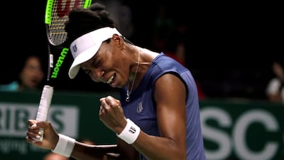 Venus Williams celebrates after beating Garbine Muguruza at the WTA Finals. Jeremy Lee / Reuters