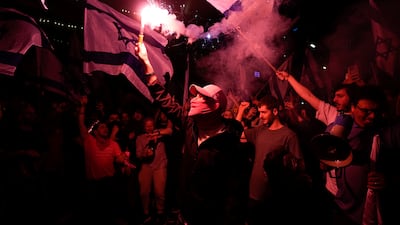 Israelis block a road in Tel Aviv. AP