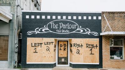 A hair salon in Morgan City, Louisiana, is boarded up ahead of Hurricane Delta. Bloomberg