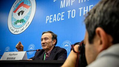 Former Syrian opposition leader of Law-Citizenship-Rights Movement (QMH) Haytham Manna answers questions during a press conference on the sidelines of a plenary session at the Congress of Syrian National Dialogue in Sochi. Alexander Nemenov / AFP