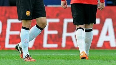 Manchetser United's Daley Blind, left, reacts after losing 5-3 to Leicester City after the English Premier League soccer match between Leicester City and Manchester United at King Power Stadium, in Leicester, England, Sunday, Sept. 21, 2014. AP Photo/Rui Vieira