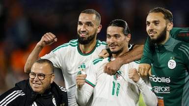 Nabil Bentaleb and Anis Hadj Moussa celebrate the win over Netherlands in Rotterdam. EPA