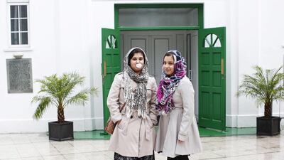 Madiha, 12, and Afsha, 11, pose for a picture outside London Mosque in west London. Madiha and Afsha started to wear the hijab around the age of 8. They wear the hijab for religious observance, modesty and to protect themselves.