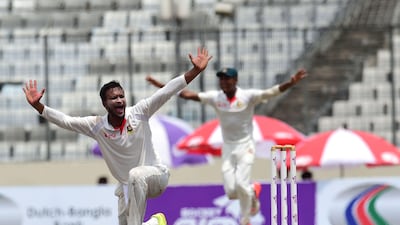 Shakib Al Hasan took 10 wickets in Bangladesh's 20-run victory over Australia. Munir Uz Zaman / AFP