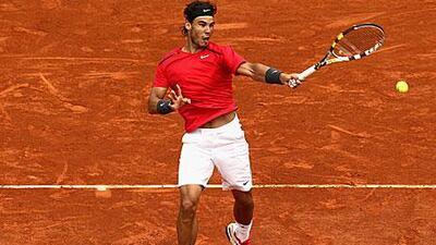 Rafael Nadal plays a forehand during his seventh French Open win.